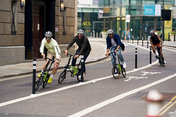 5th floor cycling club riding Brompton bikes in London