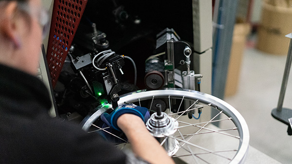 Heaven-Leigh Merrigan working in the Brompton factory